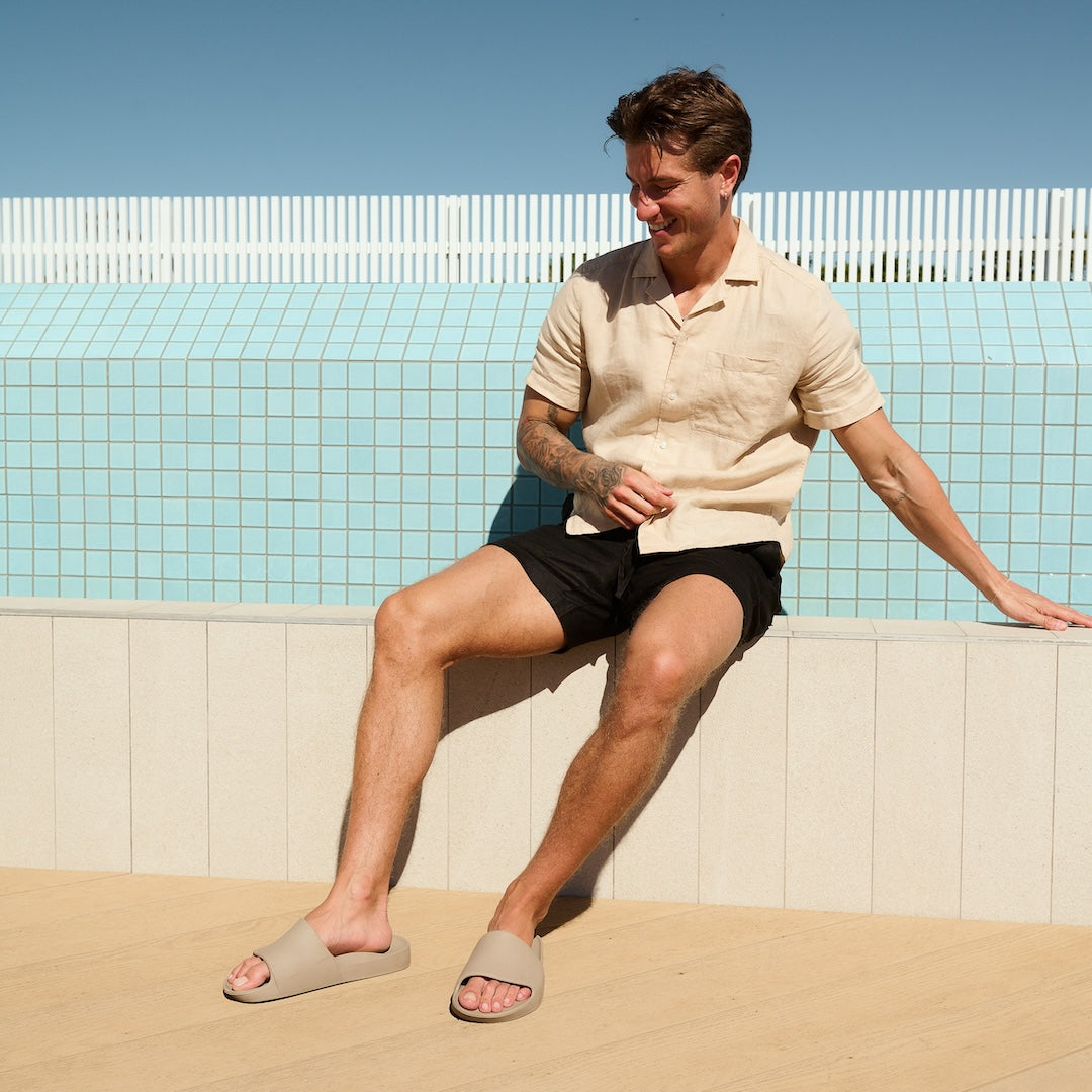 Taupe-mens-slides-sitting